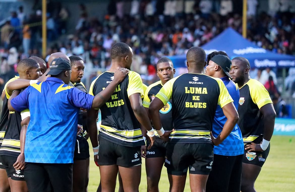 University players in a huddle before kick-off