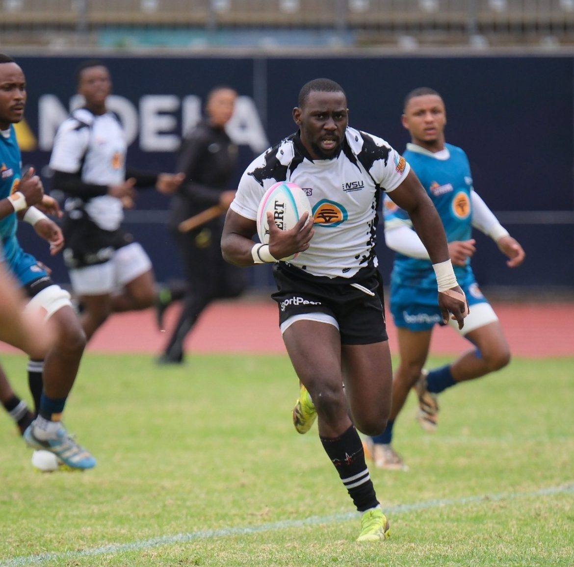 Walter Sisulu University wing breaks clear in the Varsity Shield